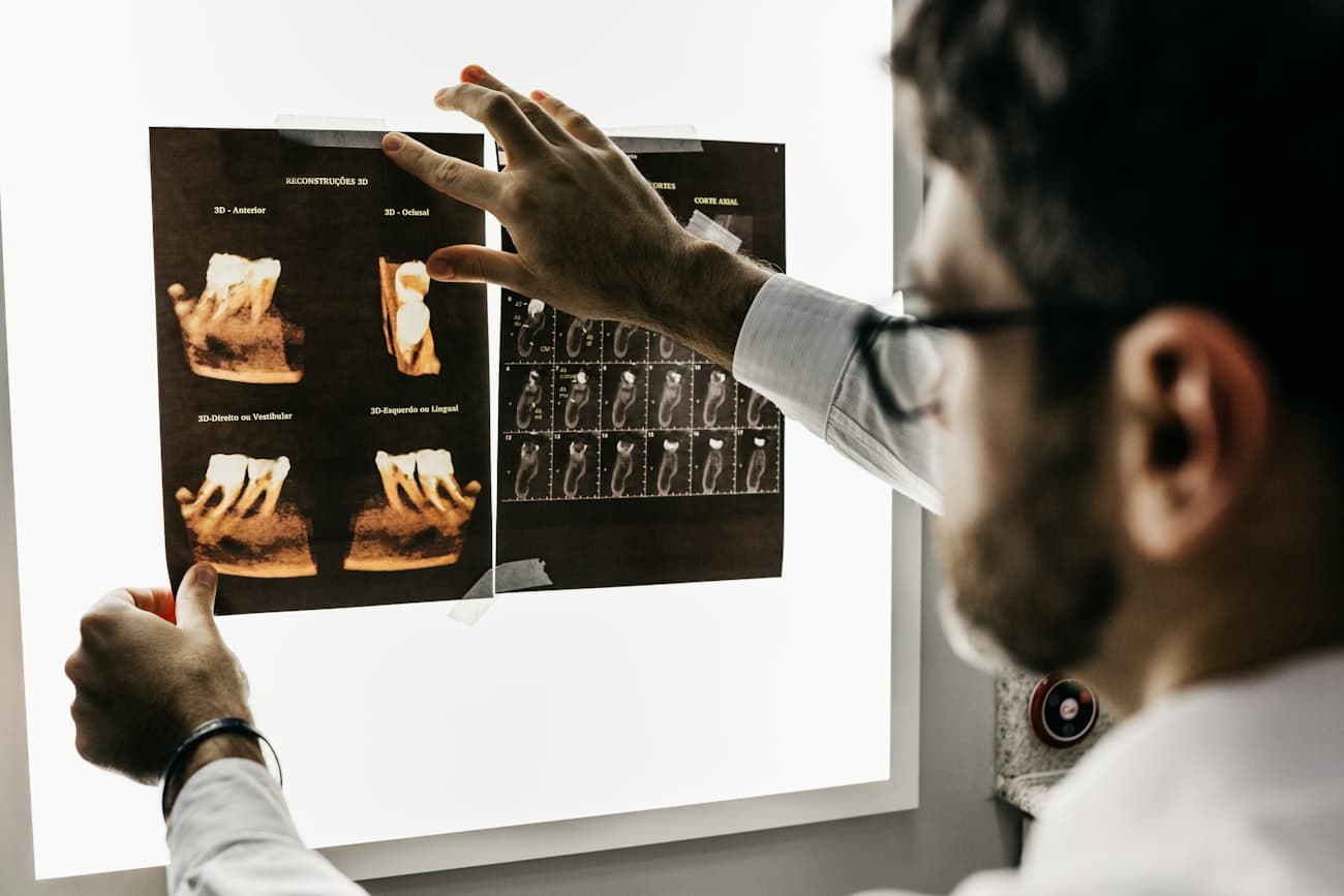 A clinician reviewing records flagged for human verification